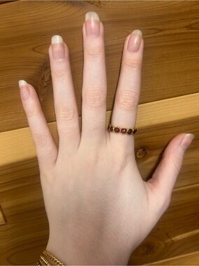 Gold Band Ring with Red Garnet Accents